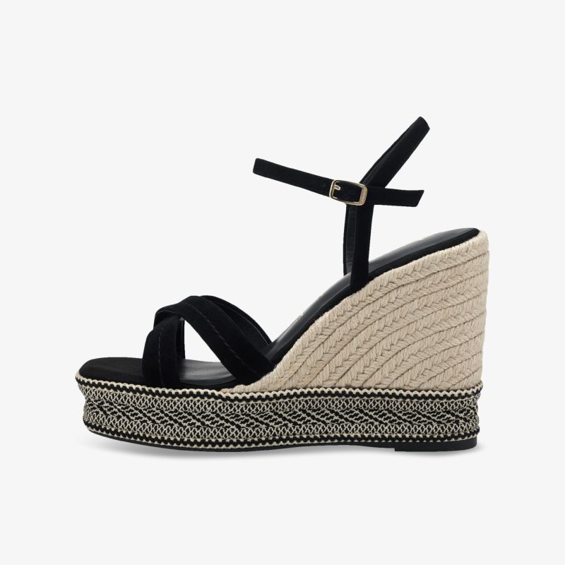 Stilvolle schwarze Wedges-Sandaletten mit bequemer Plateau-Sohle und elegantem Design für modische Sommerlooks.