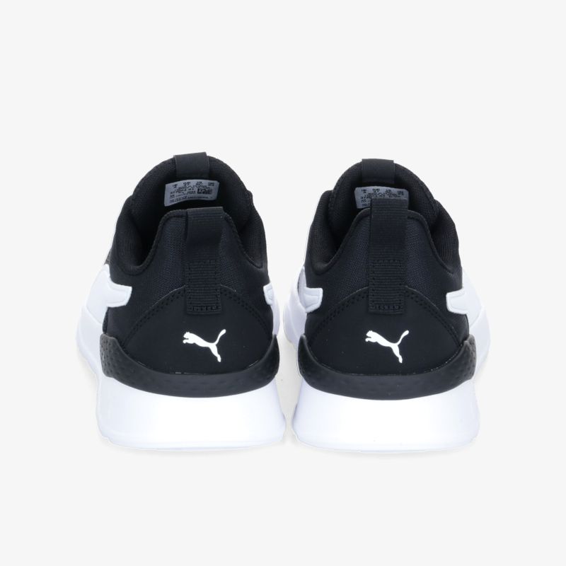 Rückansicht der stilvollen schwarzen und weißen Sneaker mit Logo, ideal für Sport und Alltag.