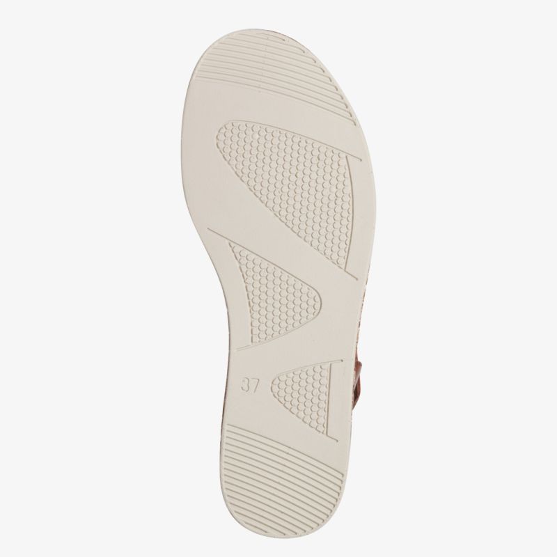Beige Schuhsohle mit rutschfestem Profil und flexibler, langlebiger Konstruktion für hohen Tragekomfort