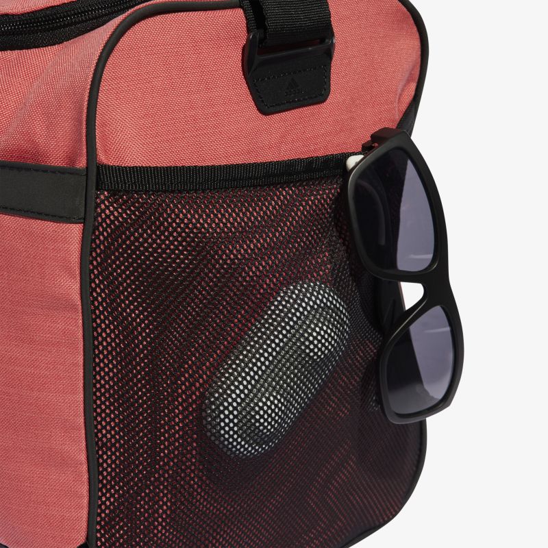 Modische Tasche mit praktischer Netzseitentasche, ideal für Sonnenbrillen und kleinere Gegenstände.