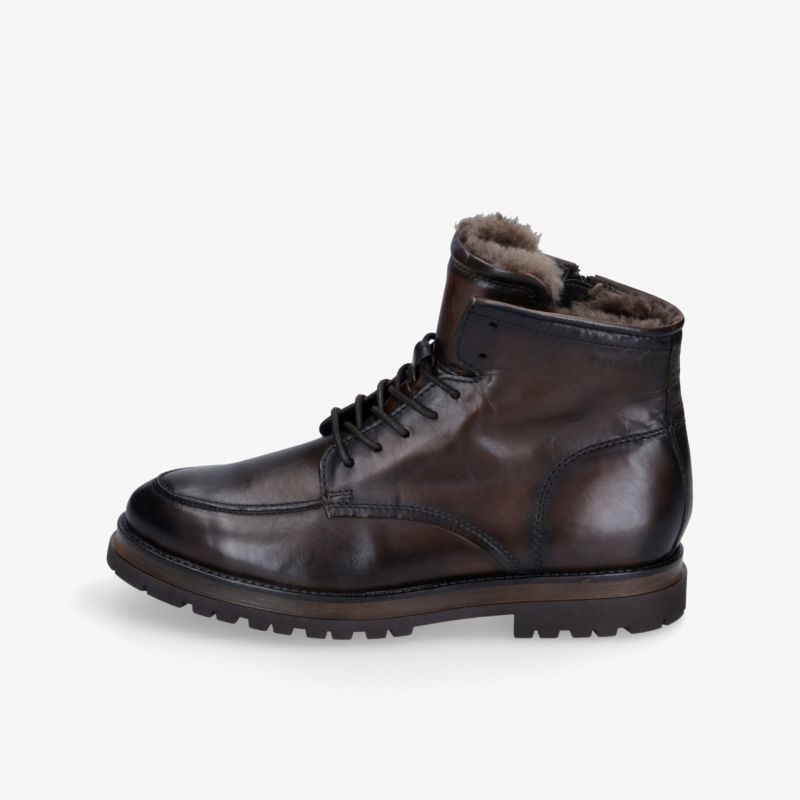 Braune Lederstiefel mit warmem Futter, robustem Design und rutschfester Sohle. Perfekt für kalte Tage.