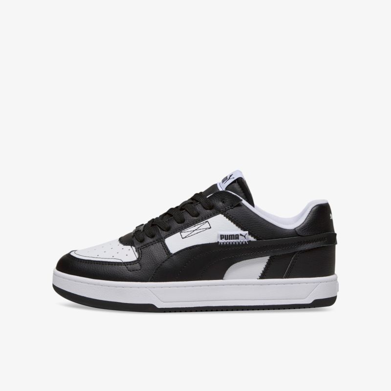 Klassische schwarz-weiße Sneakers mit komfortabler Passform und sportlichem Look. Vielseitig für jeden Anlass.