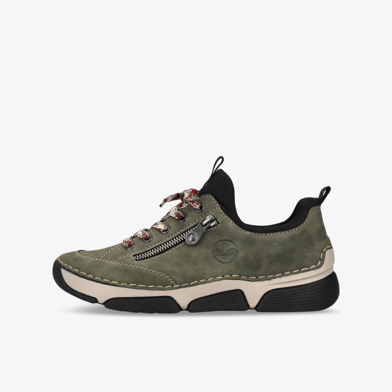 Grüner Sneaker in klarer seitlicher Ansicht mit Reißverschluss, weichem Material und robuster Sohle für maximalen Komfort
