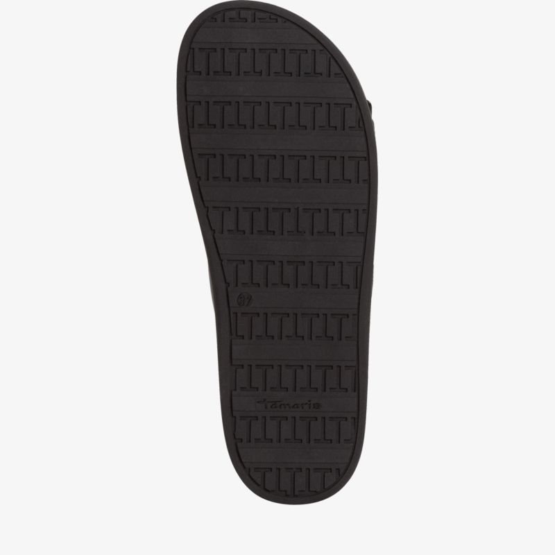 Schwarze Schuhsohle mit tiefem Profil für optimalen Halt und hohe Strapazierfähigkeit