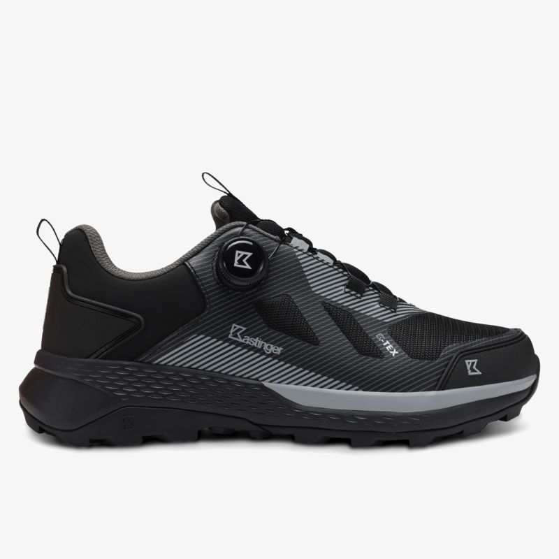 Schwarzer sportlicher Schuh seitliche Ansicht mit komfortabler Passform und rutschfester Sohle