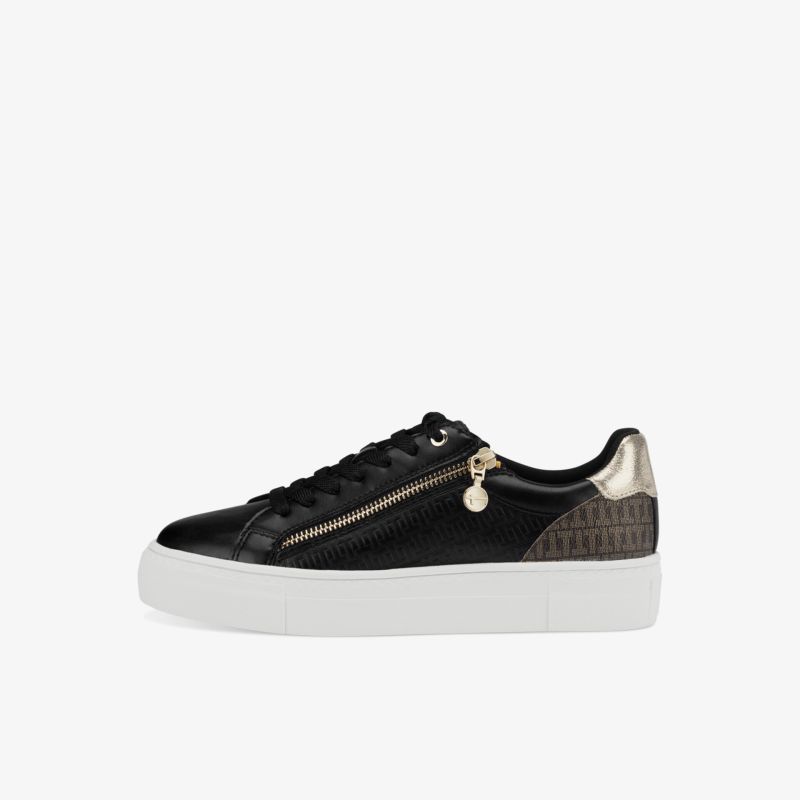 Moderner schwarzer Sneaker mit Reißverschlussdetails und metallic Akzenten, ideal für einen stilvollen Auftritt.