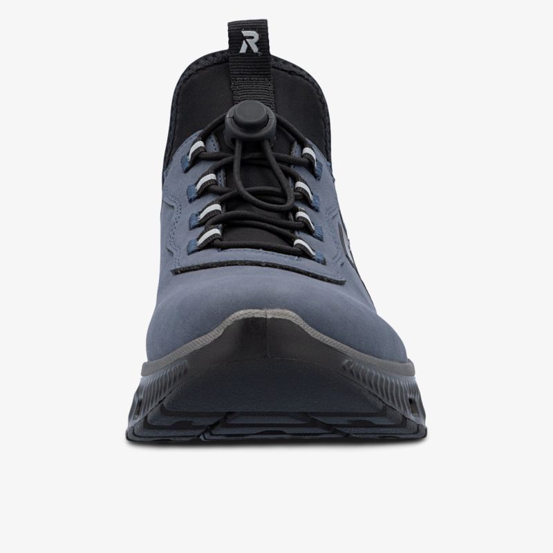Robuster Schuh mit sportlichem, modernem Design und griffiger Sohle in klarer Frontansicht
