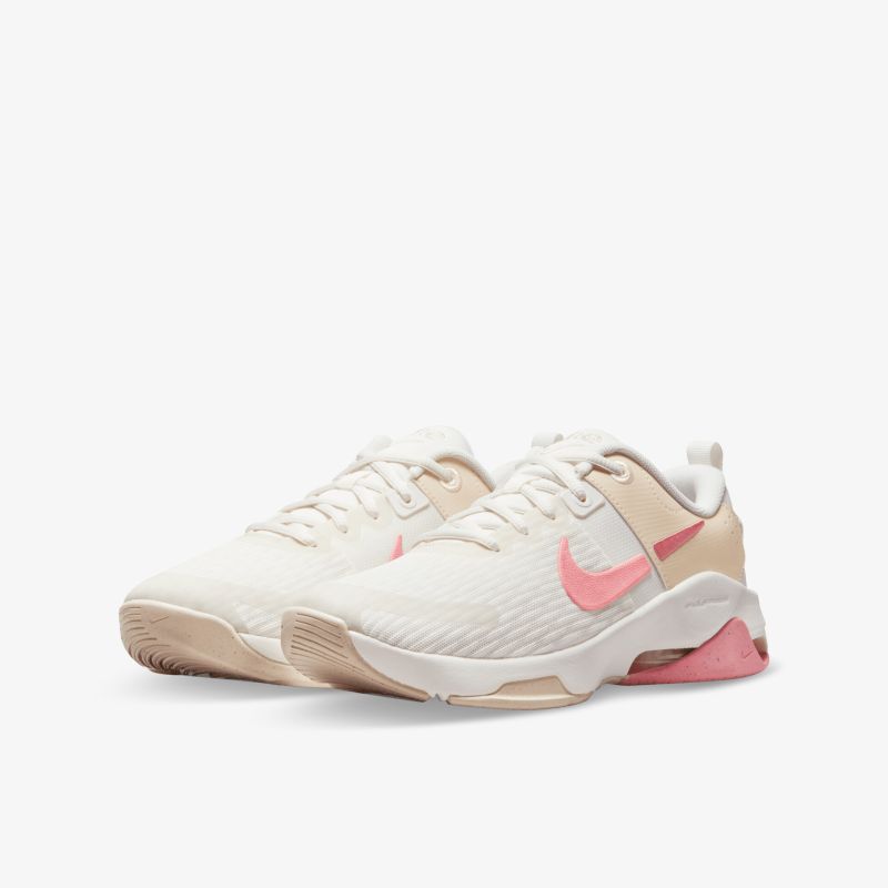Moderne Sneaker in Weiß und Rosa mit bequemer Passform und sportlichem Design für vielseitigen Einsatz.
