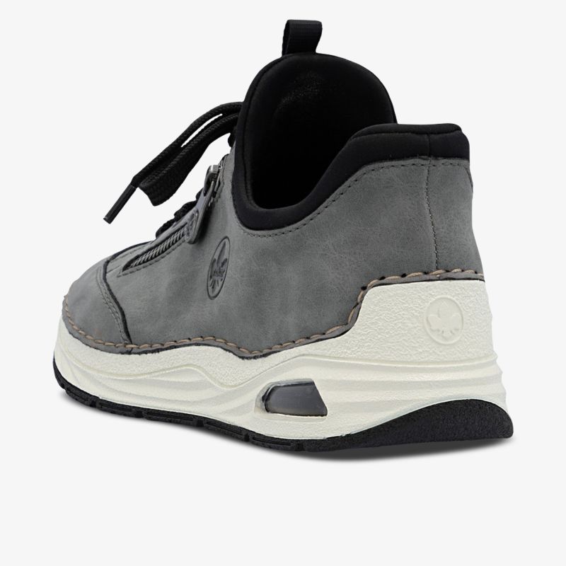 Grauer Schuh mit komfortabler weißer Sohle und strapazierfähigem Material, seitliche Ansicht