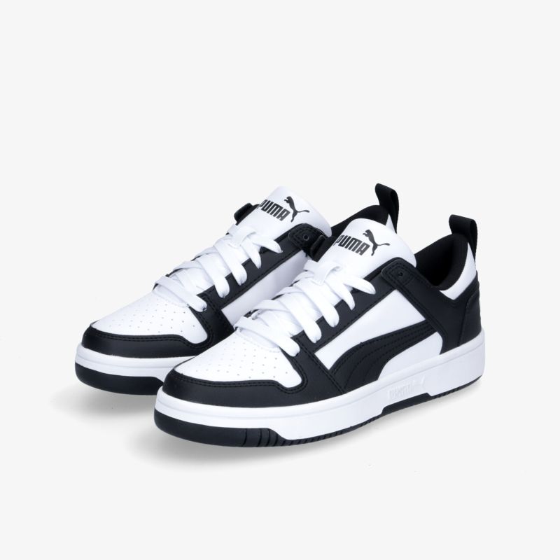 Stilvolle weiße und schwarze Sneakers mit rutschfester Sohle und sportlichem Design, ideal für Alltag und Freizeit.