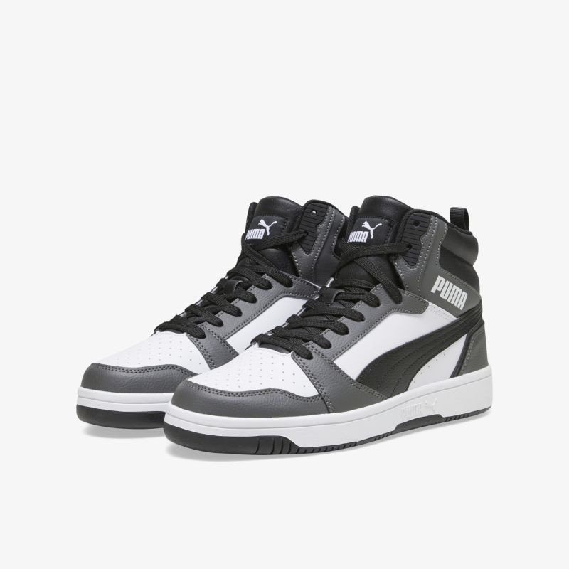 Schwarz-weiße Puma Sneaker als Paar, hoher Schaft, bequeme Passform und rutschfeste Profilsohle