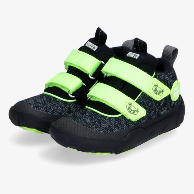 Stylische Schuhe mit neonfarbenen Klettverschlüssen und stabilem Design für vielseitigen Einsatz.