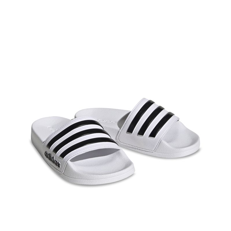 Weiße Sandalen mit schwarzen Streifen, ideal für bequemes und stylisches Auftreten im Alltag.