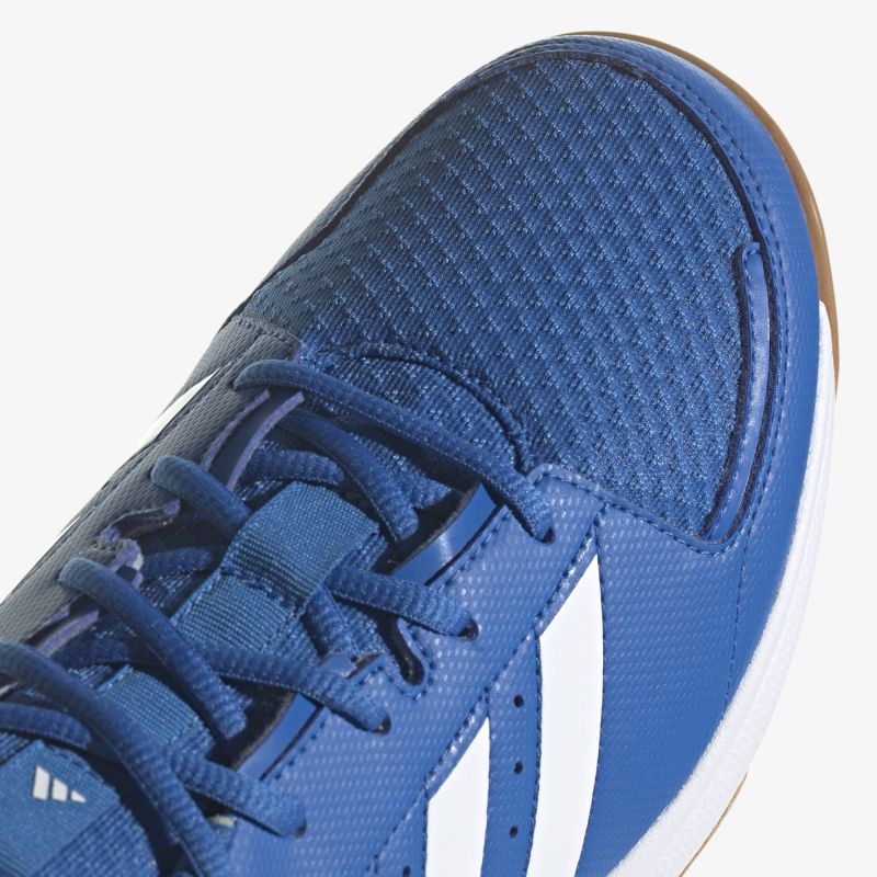 Sportlicher blauer Schuh mit atmungsaktivem Obermaterial und stylischem Design für optimalen Tragekomfort.