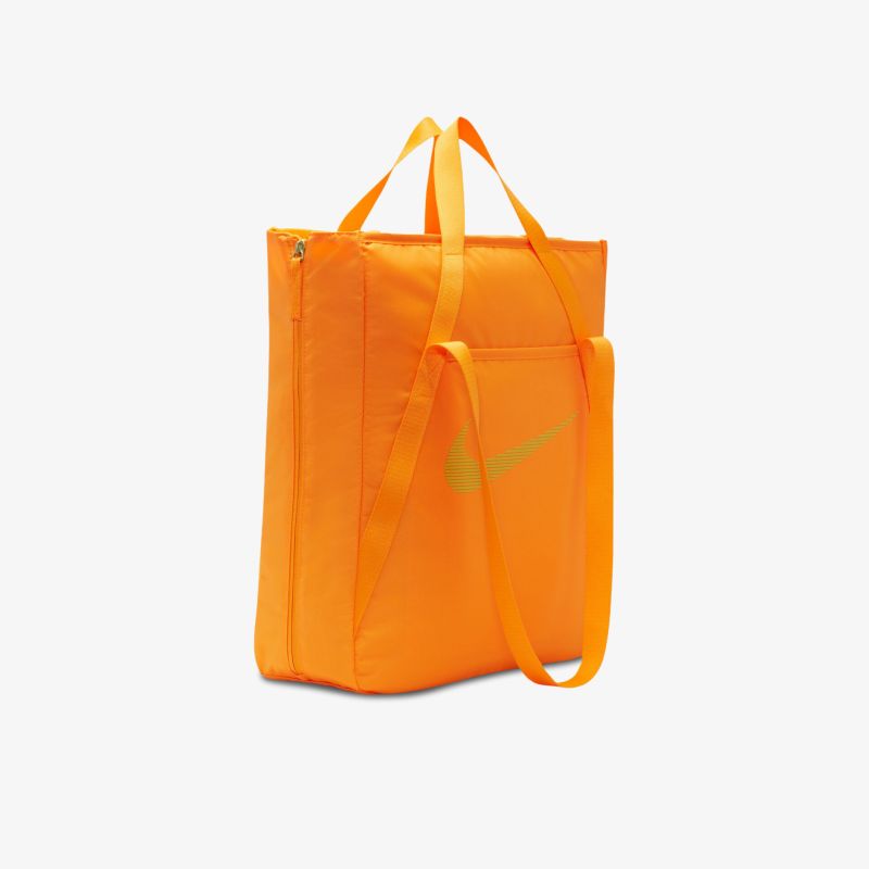 Modische orange Tasche mit praktischen Trägern und geräumigem Innenraum für vielseitigen Einsatz.