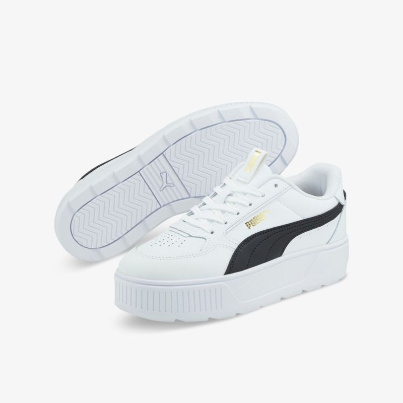 Stilvolle weiße Sneaker mit schwarzem Detail und erhöhter Sohle für optimalen Komfort und modisches Design.