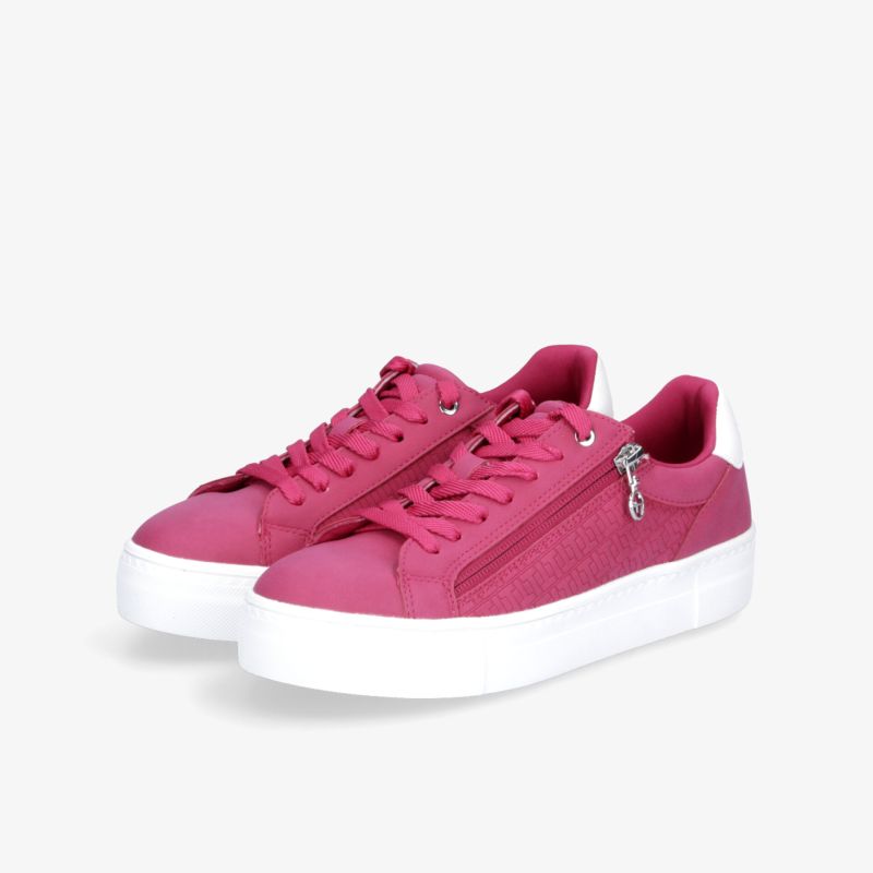 Sportlicher pinker Sneaker mit dicker weißer Plateau-Sohle, bequem und modisch für den Alltag