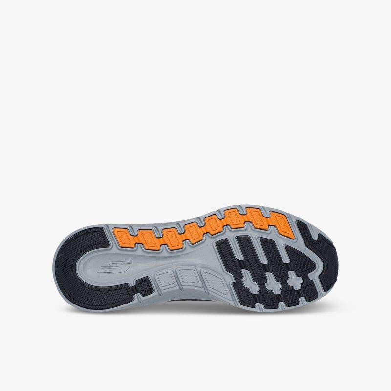 Robuste graue Schuhsohle mit orangefarbenem Profil für optimalen Halt und hohe Verschleißfestigkeit
