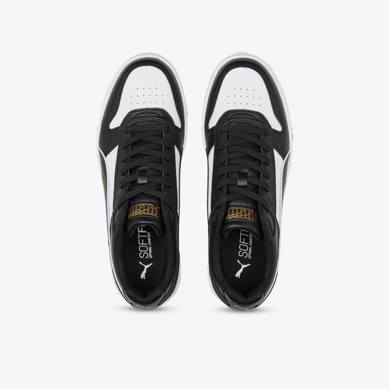 Schwarze und weiße Sneaker mit klassischem Design und bequemer Passform. Perfekt für Alltag und Freizeit.