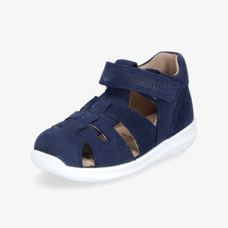 Praktischer, dunkelblauer Schuh mit Klettverschluss und rutschfester Sohle – ideal für Komfort und sicheren Halt.