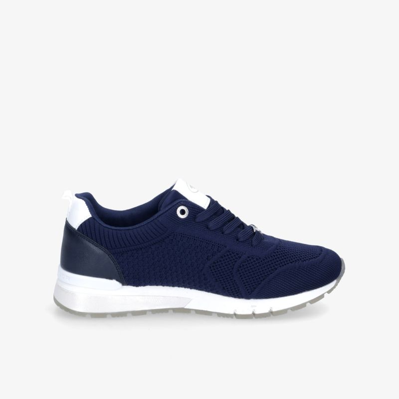 Moderner blauer Sneaker mit weißer Sohle und angenehmem Tragekomfort, Seitenansicht.