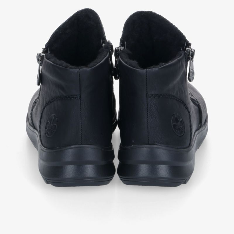 Schwarze Winterstiefel mit warmem Innenfutter und stabiler rutschfester Sohle, ausgestattet mit Reißverschluss für einfachen Einstieg