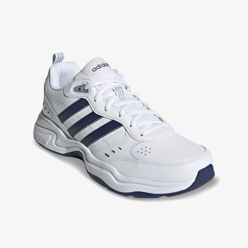 Weiße Sneaker mit dunkelblauen Akzenten und bequemem Design. Perfekt für stilvolle Freizeitaktivitäten.