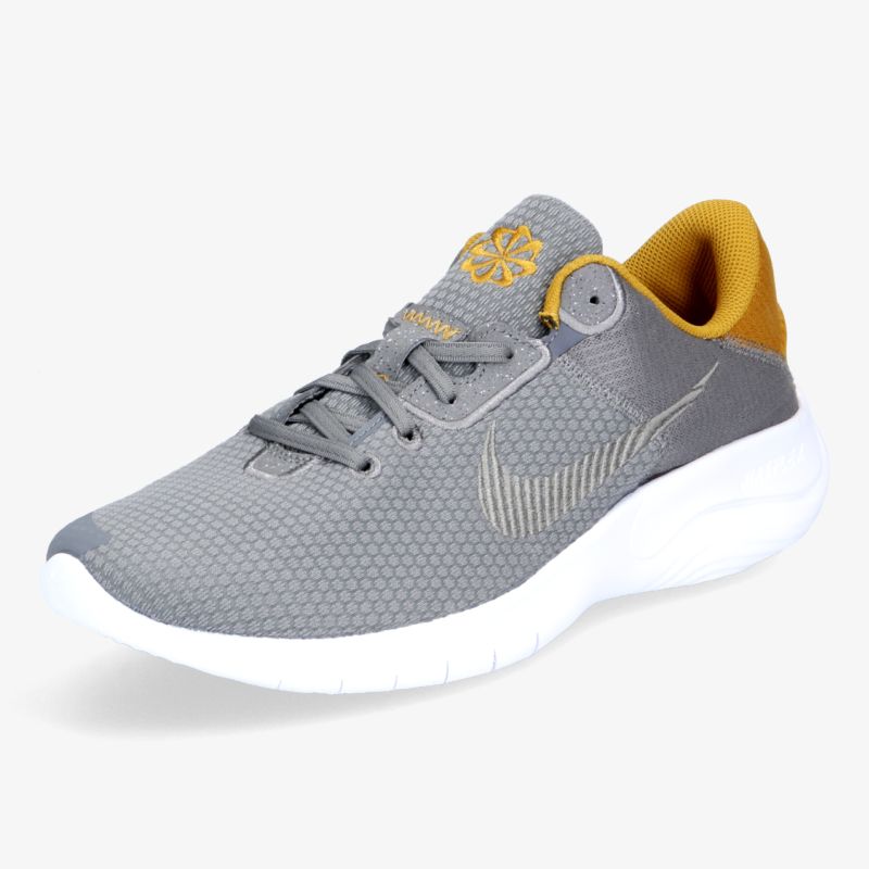 Grauer Sneaker mit gelbem Akzent und weißer Sohle bietet Komfort und Stil für den Alltag und sportliche Aktivitäten.