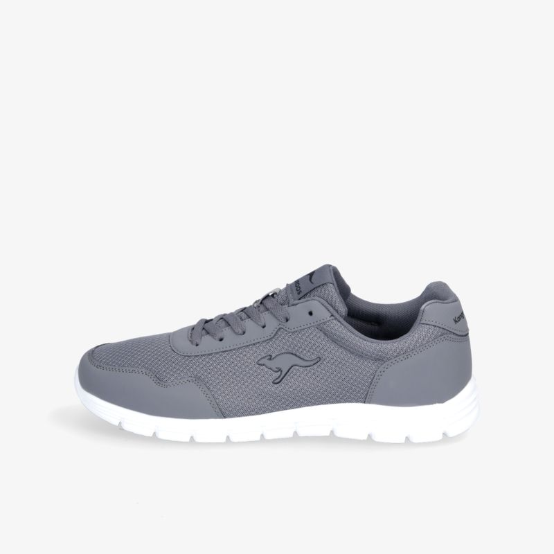 Grauer Sneaker mit weißer Sohle, sportlich und modisch, ideal für den Alltag, bietet Komfort und Stil.