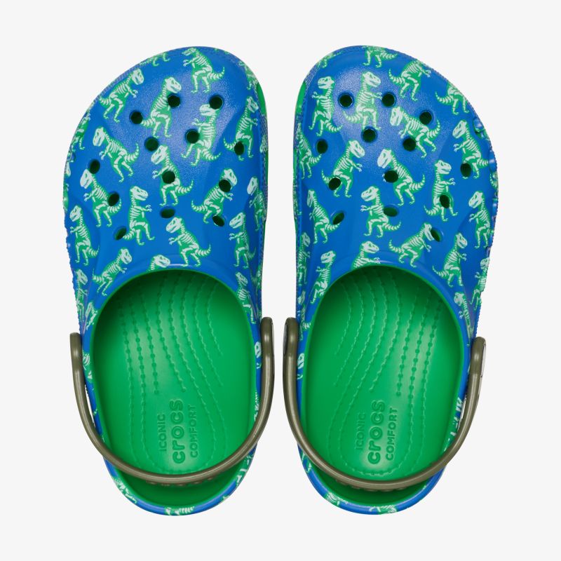 Bequeme blaue Schuhe mit fröhlichem Dinosaurier-Muster und grünem Innenfutter. Ideal für Freizeit und Spiel.