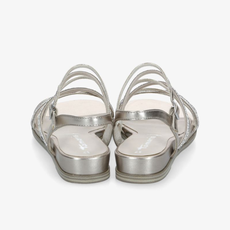 Rückansicht von silbernen Sandalen mit Riemchen, flacher Absatz und elegantem Design