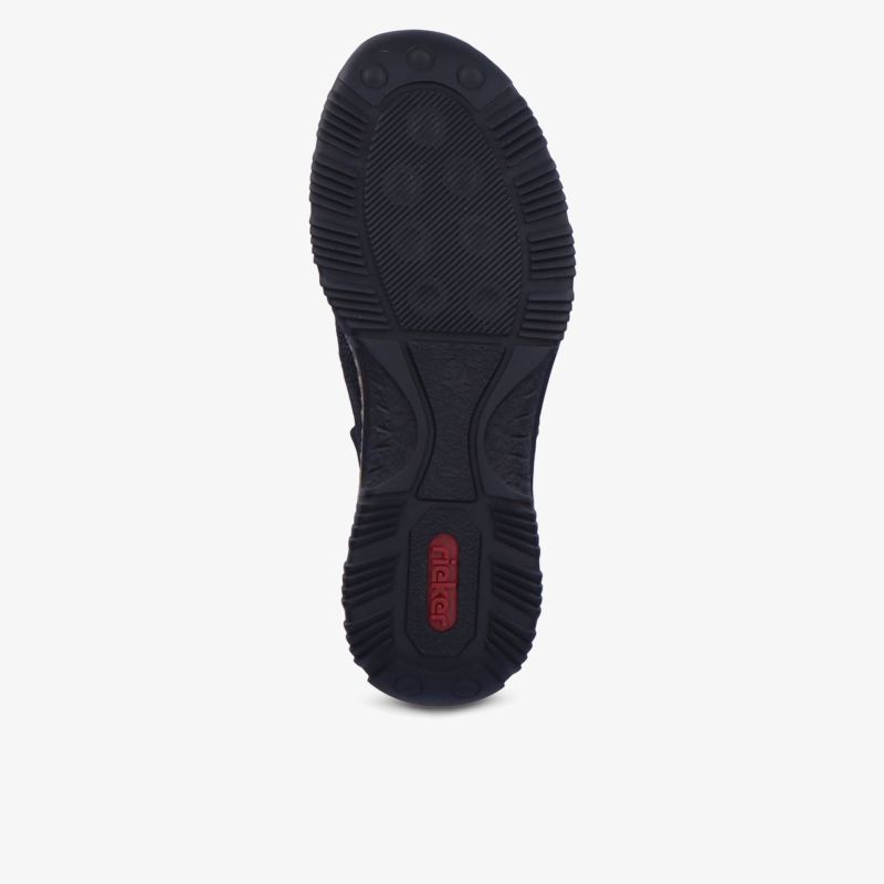Robuste rutschfeste Schuhsohle mit tiefem Profil für sicheren Stand und hohe Haltbarkeit