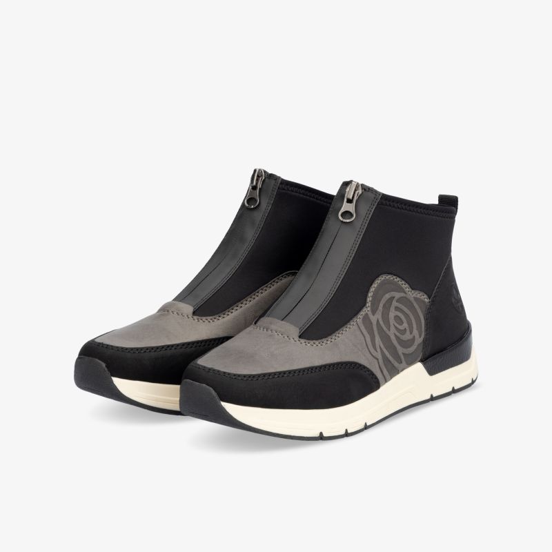 Modern gestalteter leichter Schuh mit flexiblem Material und praktischem seitlichem Reißverschluss für maximalen Komfort