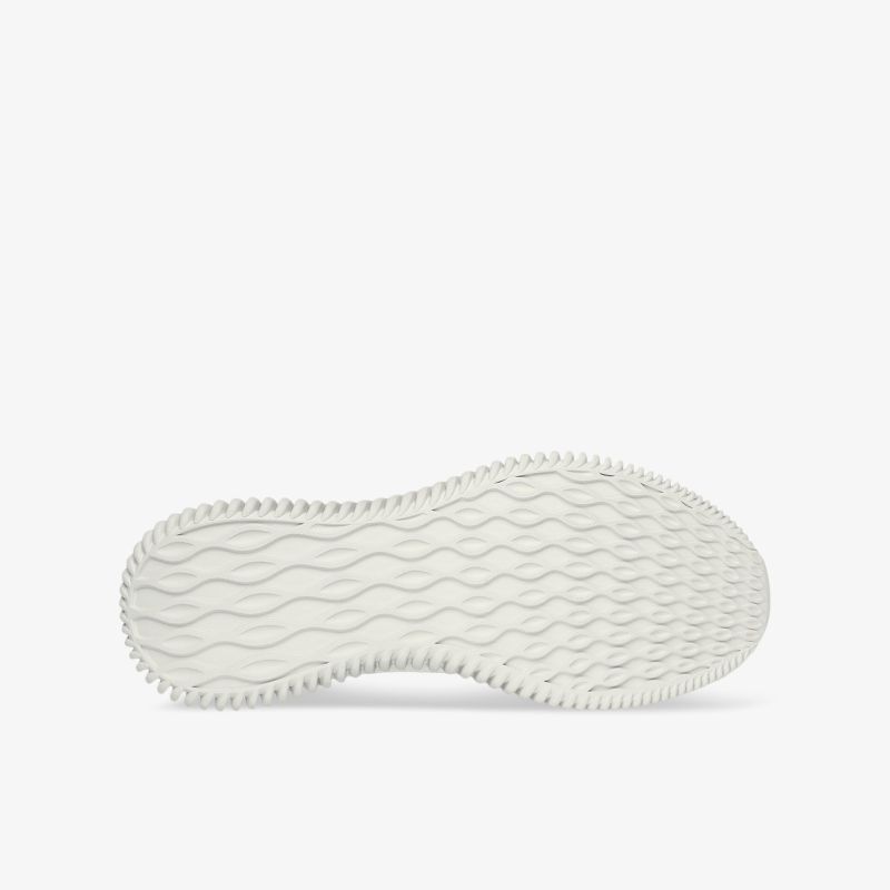 Weiße Schuhsohle mit rutschfestem und flexiblem Profil für optimalen Halt und Komfort bei jedem Schritt