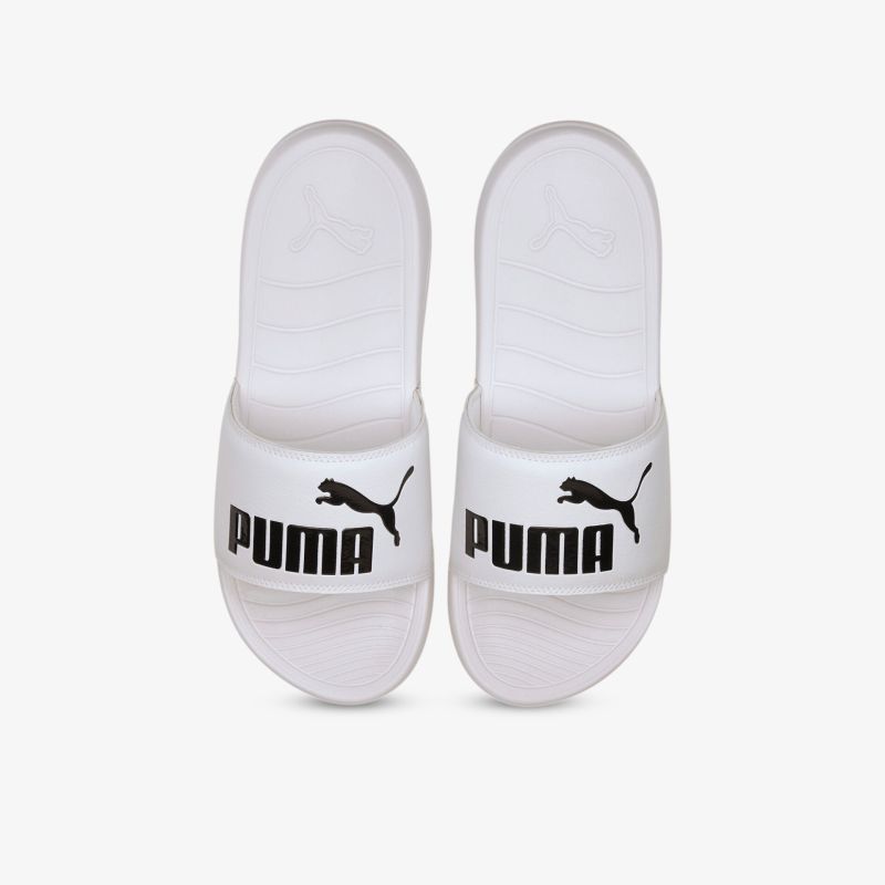 Weiße PUMA Slides mit Logo, ideal für Freizeit und Komfort, langlebig und stilvoll für den Alltag.