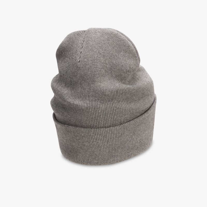 Graue Strickmütze aus weichem Material für optimalen Komfort und Wärme, perfekt für kaltes Wetter.