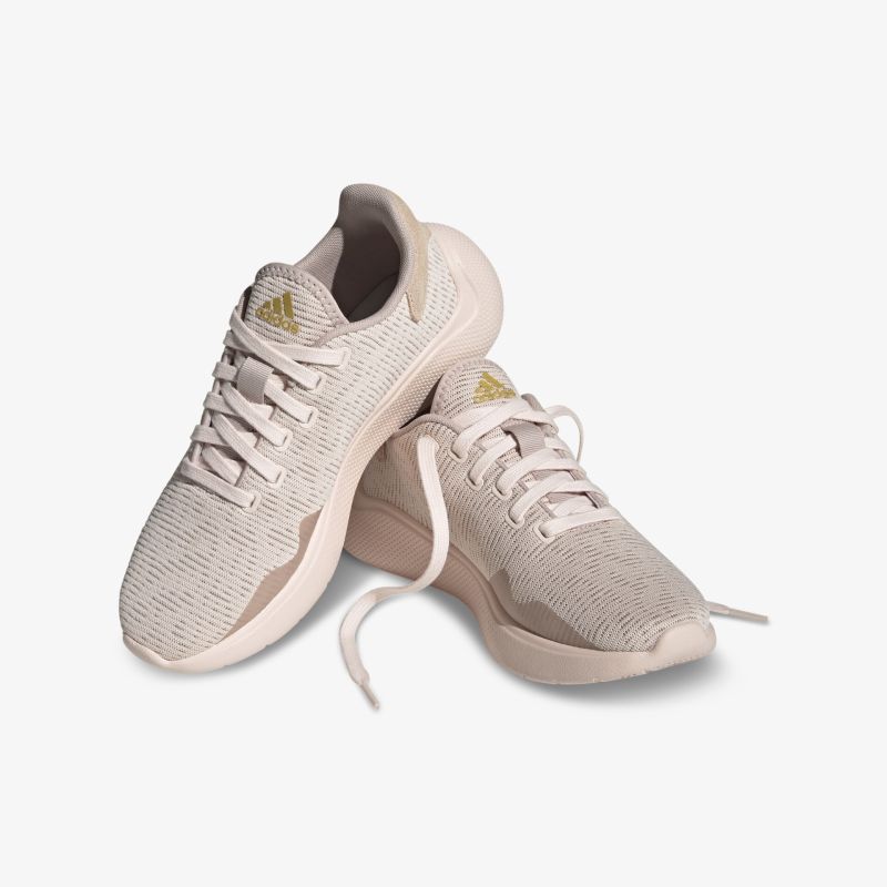 Moderne beige Sneakers mit flexiblem Design und atmungsaktivem Material für optimalen Komfort.