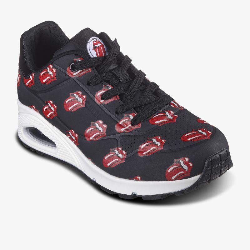 Moderner schwarzer Sneaker mit auffälligem roten Design und bequemem Fit. Perfekt für Alltag und Freizeit.