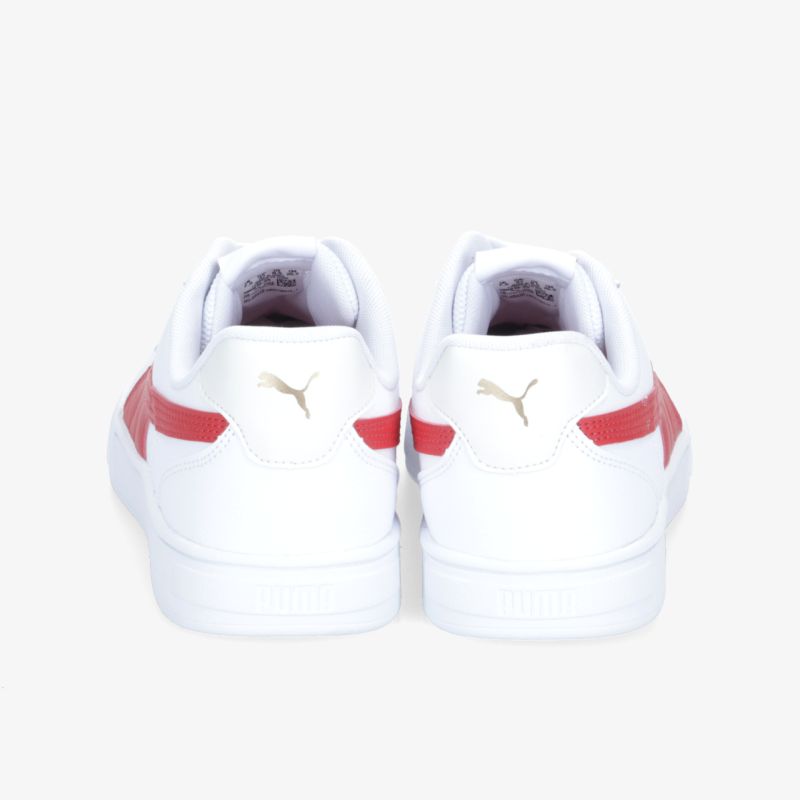 Klassische weiße Sneaker mit rotem Akzent, ideal für sportliche und modische Looks. Komfortabel und stilvoll.