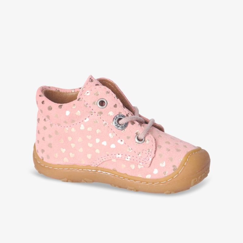 Rosafarbene Kinderschuhe mit Punktmuster und rutschfester Sohle, bequem und stilvoll für kleine Füße.