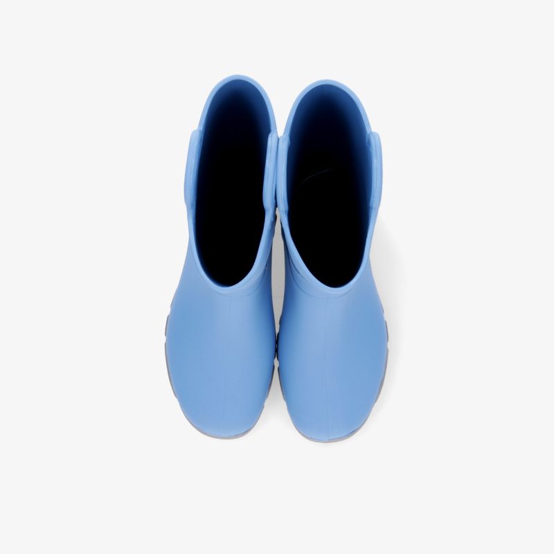 Blaue Regenstiefel in Top-Down Ansicht, robust und wasserfest, ideal für regnerische Tage.