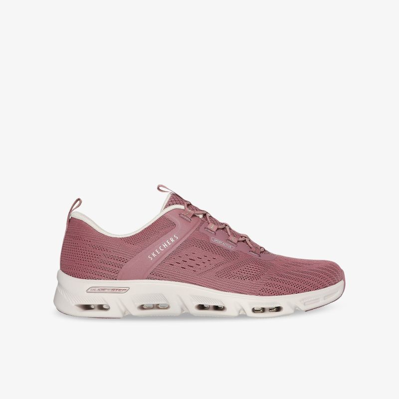 Sportlicher rosa Sneaker mit flexibler Sohle und schnürbarem Obermaterial in klarer seitlicher Ansicht