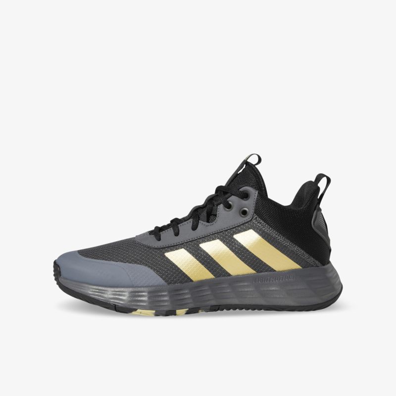 Moderner Sport-Sneaker in Schwarz mit goldenen Akzenten für optimalen Komfort und Stil.