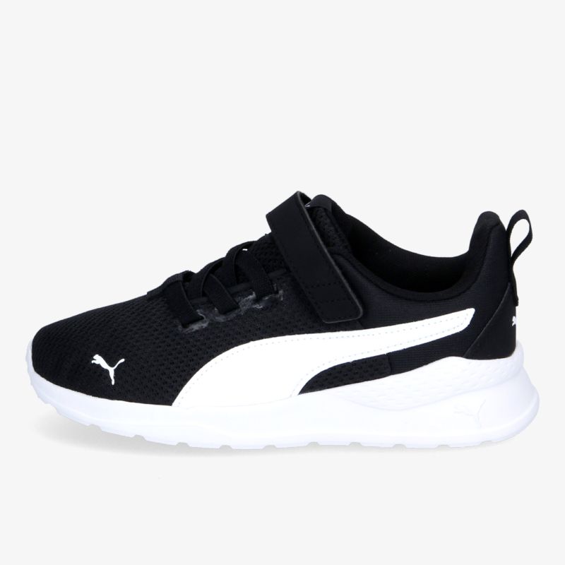 Moderner schwarzer Sneaker mit weißer Sohle und Klettverschluss, ideal für Sport und Freizeit.