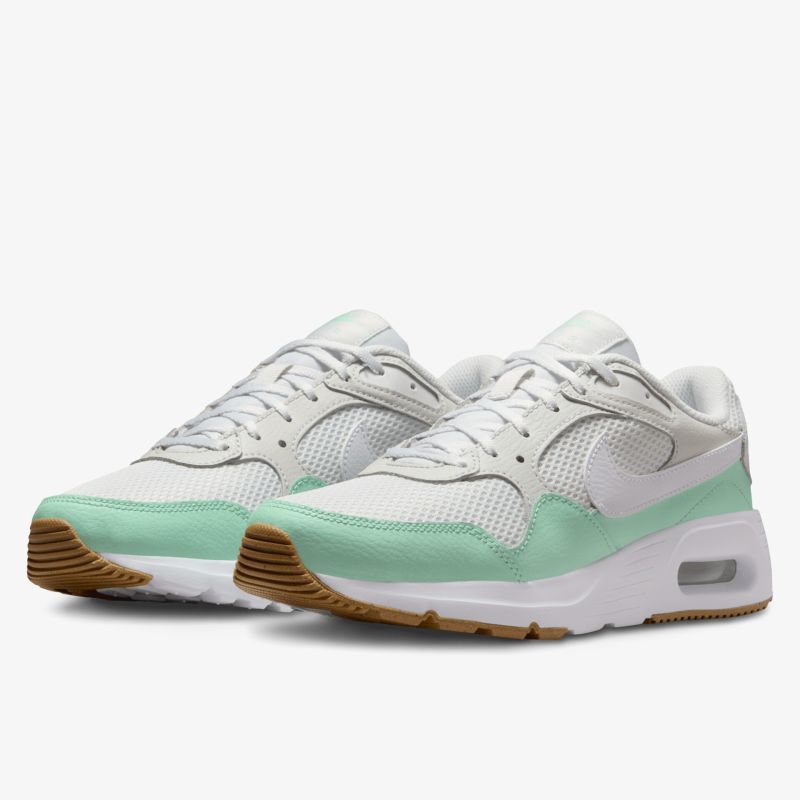 Weiß-grüne sportliche Sneaker mit atmungsaktivem Material und bequemer Passform, modernes Design
