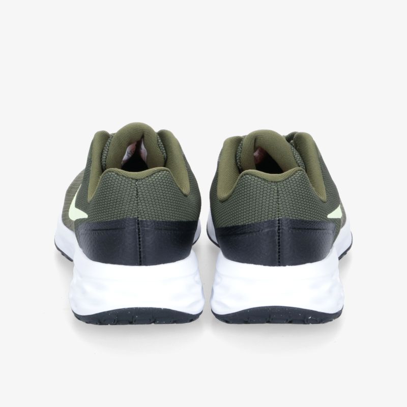 Bequeme grüne Laufschuhe mit stabilen Sohlen für optimalen Halt und Komfort beim Sport.