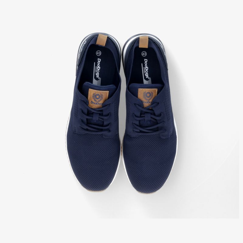 Dunkelblaue Sneaker im Paar aus der Draufsicht, komfortabel mit flexibler Sohle und klassischer Schnürung