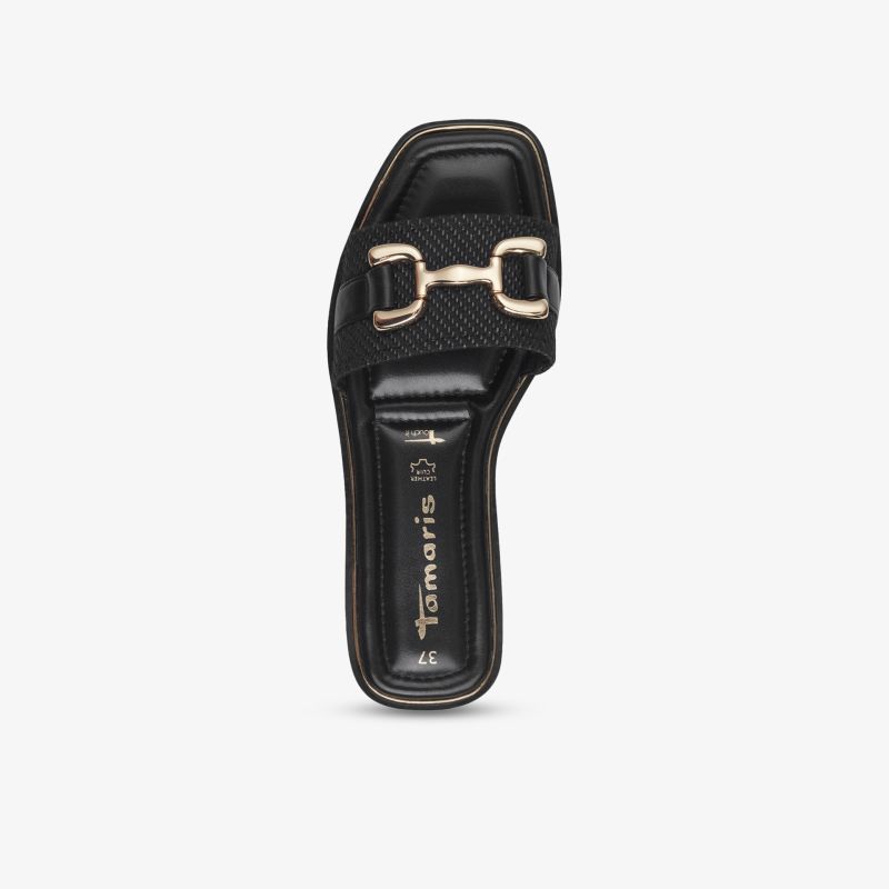 Schwarzer Slip-In Schuh mit quadratischer Spitze und auffälliger goldener Metallverzierung, bequem und modern