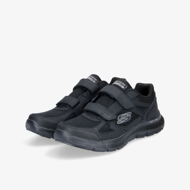 Bequeme, robuste schwarze Sneakers mit praktischen Klettverschlüssen für vielseitige Einsatzmöglichkeiten.