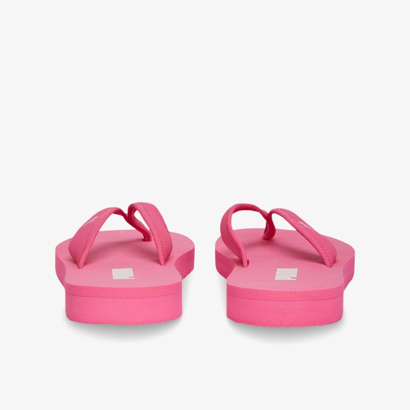 Bequeme pinke Flip-Flops mit rutschfester Sohle, ideal für den Sommer und Strandausflüge.